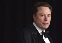 Elon Musk Says Productivity Reports Due For Federal Workers Or Resign Elon Musk in a bowtie at an event in Los Angeles, April 13th 2024.