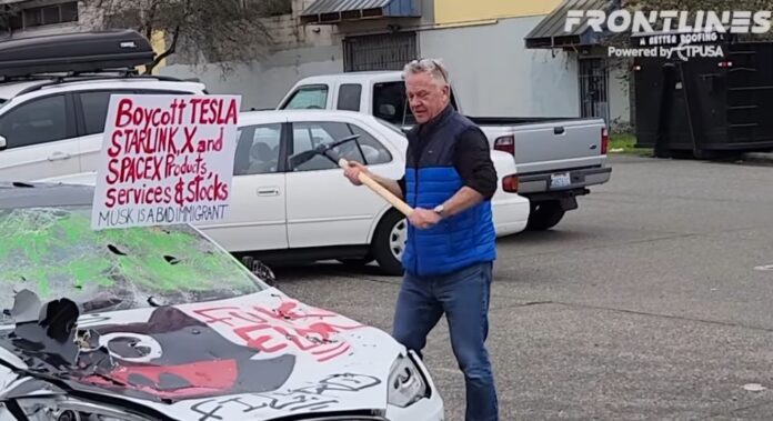 man-buys-tesla-to-destroy-it Man Buys Tesla just to destroy it.