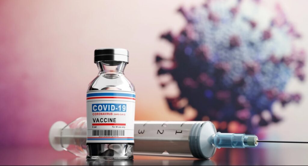 Covid 19 Vaccine and Syringe