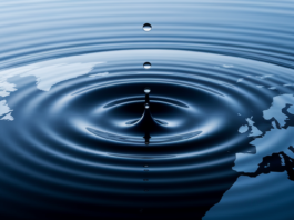 Global map as water with ripples from US.